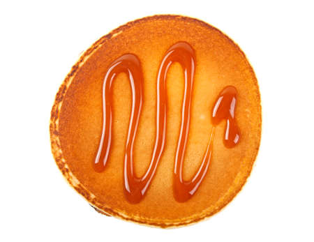 Pancake with caramel isolated on a white background. Healthy breakfast.の写真素材