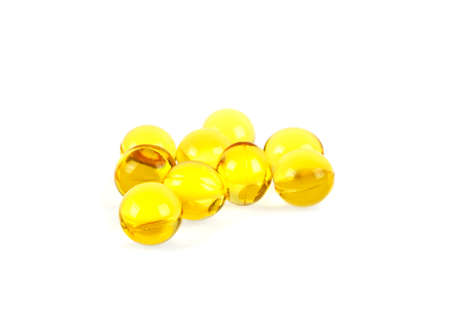 Cod liver oil omega 3 gel capsules on a white background