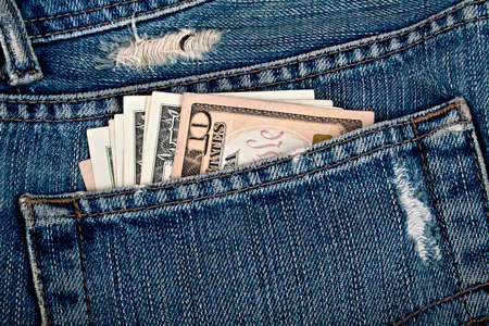 American dollars in a blue jeans pocketの写真素材