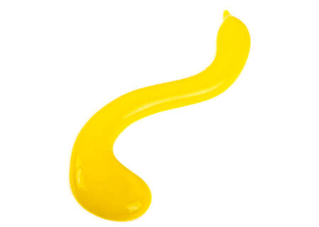 Mustard sauce. Strip of mustard on a white background.の写真素材