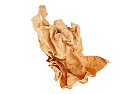 Crumpled old brown paper on white backgroundの写真素材