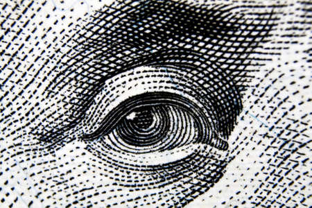 Eye. Fragment of $100 banknote.