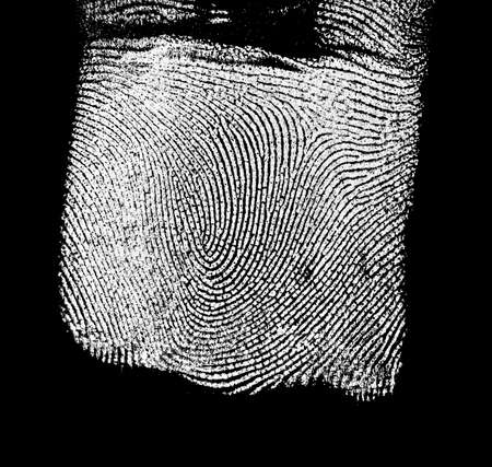 Fingerprint pattern on black backgroundの写真素材