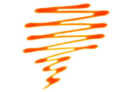 Splash of caramel isolated on a white backgroundの写真素材