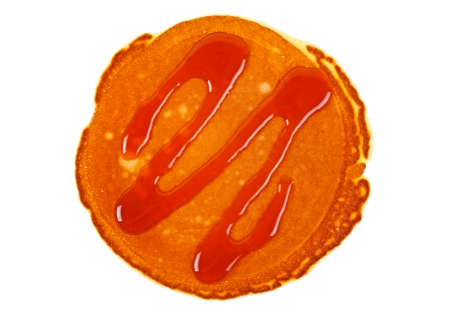 Pancake with caramel isolated on a white background. Healthy breakfast.の写真素材