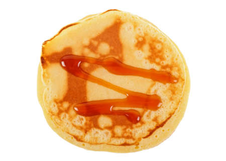 Pancake with caramel isolated on a white background. Healthy breakfast.の写真素材