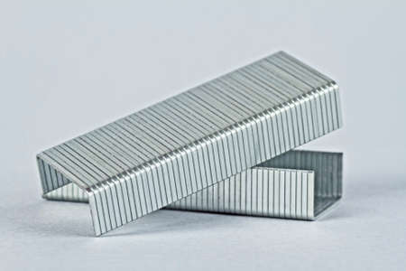 Staples wires on grey background