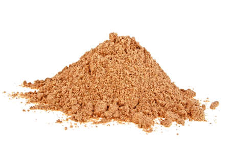 Cinnamon powder isolated on a white backgroundの写真素材