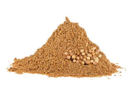 Seeds and powder of coriander spice on white backgroundの写真素材