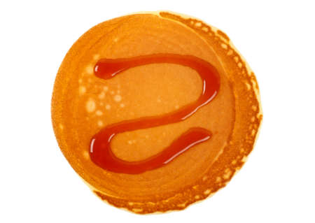 Pancake with caramel isolated on a white background. Healthy breakfast.の写真素材
