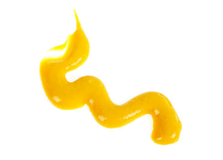 Mustard sauce on a white backgroundの写真素材