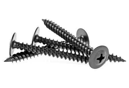 Black screws on a white backgroundの写真素材