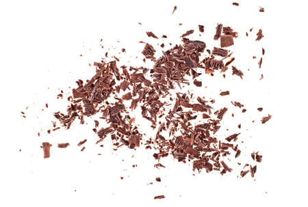Pile chopped, milled chocolate shavings on white backgroundの写真素材