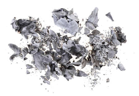 Burned paper on white background, top view.の写真素材
