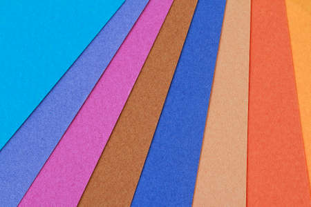 Various sheets of colored paper, as backgroundの写真素材