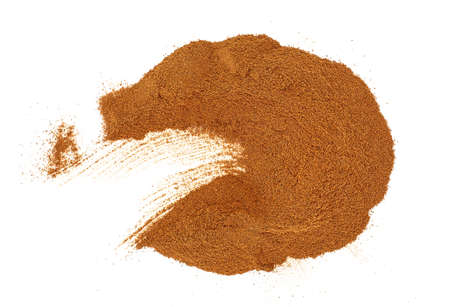 Cinnamon powder isolated on a white background. Top view.の写真素材