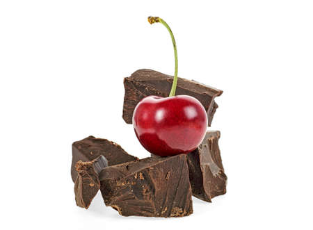 Cherry and broken chocolate isolated on white backgroundの写真素材