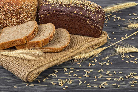 Fresh rye bread on wooden table