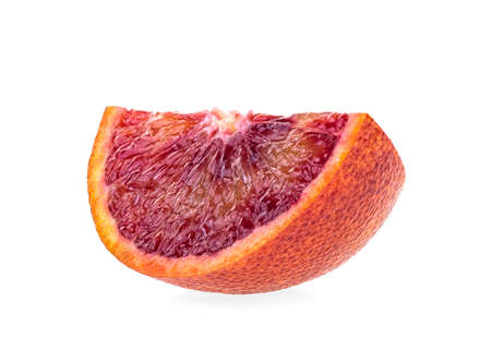 Juicy slice of Sicilian orange fruit isolated on white backgroundの写真素材
