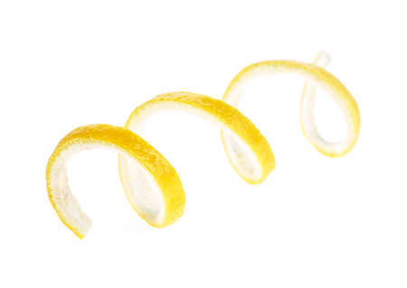 Lemon peel or lemon twist on white backgroundの写真素材