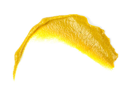 Mustard sauce. Splash of mustard on a white background.の写真素材