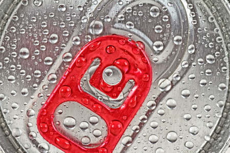 Water droplets on soda can for background. Can of beer in water drops. 