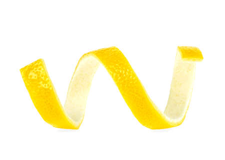 Ripe lemon peel isolated on a white background. Skin of bright yellow citrus fruit. Vitamin C. Healthy food.の写真素材