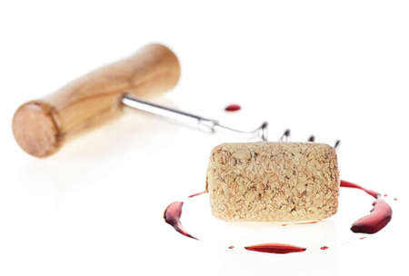Wine stain, cork and corkscrew isolated on white background