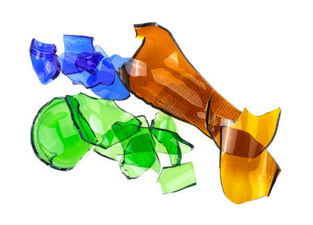 Broken glass - broken colored bottles on a white background.の写真素材