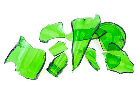 Pieces of green broken glass isolated on white background. Top view.の写真素材