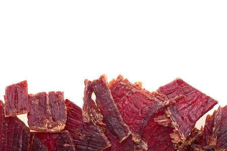 Beef jerky isolated on a white background, top view.の写真素材
