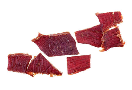 Pieces of beef jerky isolated on white background, top view.の写真素材
