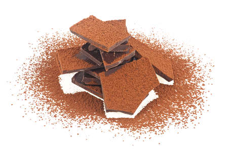 Heap of milk chocolate bar with cocoa powder isolated on a white background