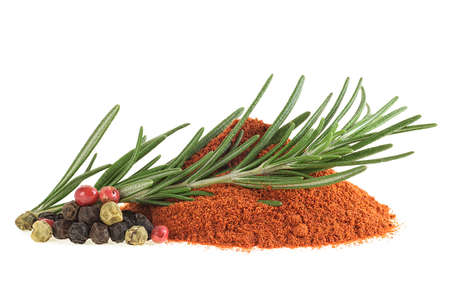 Fresh organic rosemary with peppercorns and red pepper powder isolated on white backgroundの写真素材