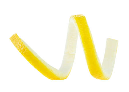 Lemon twist. Lemon peel isolated on a white background, close-up. の写真素材