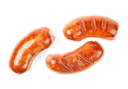 Grilled sausages isolated on a white background. Fried meat sausages.の写真素材