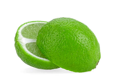 Citrus lime fruit cut in half, isolated on a white background.の写真素材