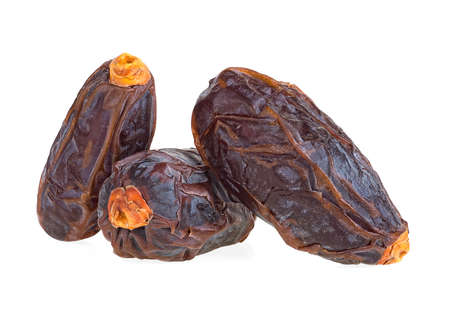 Three big dates fruits isolated on a white background. Dried sweet dates.の写真素材