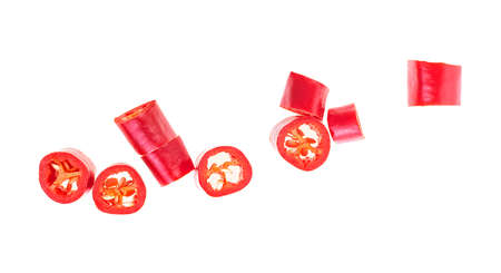 Top view of red chopped chili peppers isolated on a white backgroundの写真素材