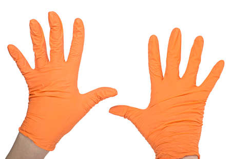 Hands of a medic wearing a latex gloves. Medical gloves. Surgical glove. Covid-19 prevention concept.の写真素材