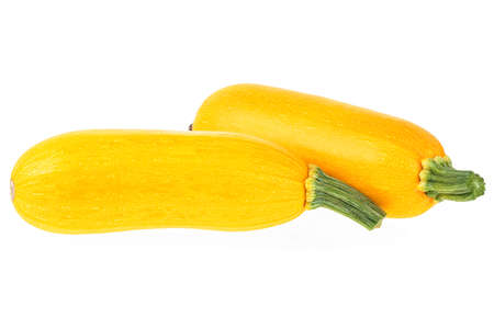 Two yellow zucchini isolated on a white background. Yellow courgettes. Yellow squash.の写真素材