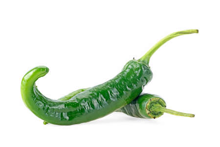 Green hot chili peppers isolated on a white background. Fresh green chillies.の写真素材