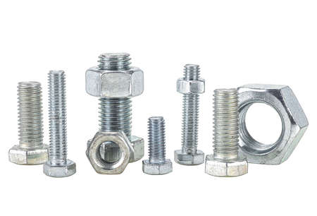 Steel nuts and bolts isolated on a white backgroundの写真素材