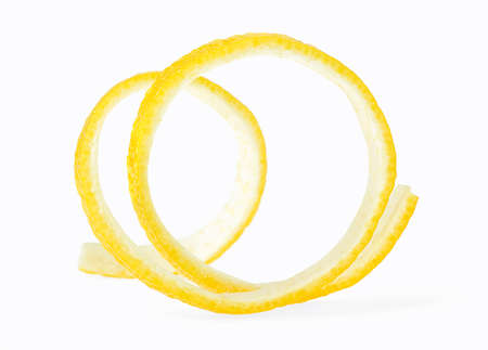 Spiral of lemon skin isolated on a white background. Lemon peel. Lemon twist.の写真素材