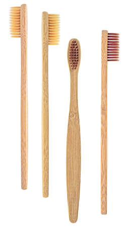 Bamboo toothbrushes isolated on a white background, dental concept. Eco-friendly bamboo toothbrushes.の写真素材