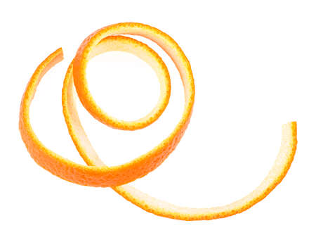 Top view of spiral orange peel isolated on a white background. Orange zest spiral.の写真素材