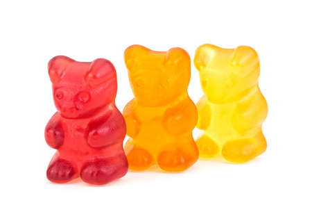 Three colorful gummy bears isolated on a white background. Colorful jelly gummy bears. Chewing jelly candies. Fruity candies.の写真素材