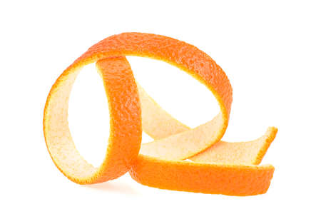 Peel of orange fruit isolated on a white background. Orange zest peel spiral.の写真素材