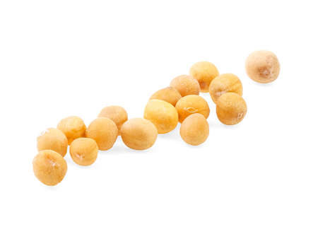 Organic yellow mustard seeds isolated on a white background. Macro image, full depth of field.の写真素材
