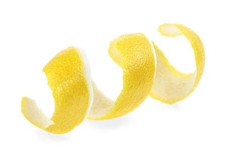 Peel of fresh ripe lemon isolated on a white background. Lemon twist. Lemon skin. Citronの写真素材